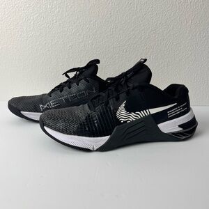 Nike Metcon 8 training shoes in a black and dark smoke grey colorway.  Size 8.5